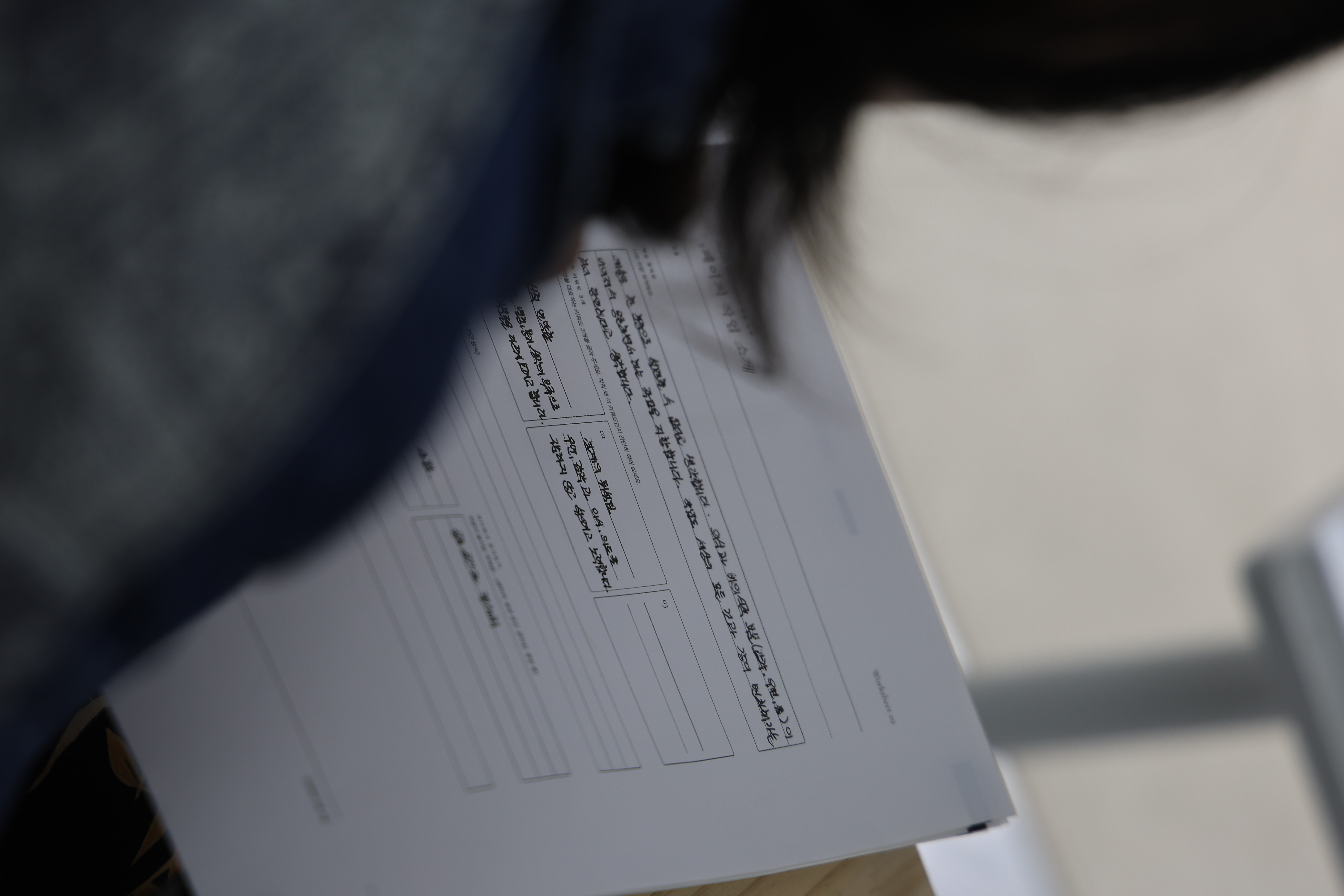 Artist reviewing worksheet